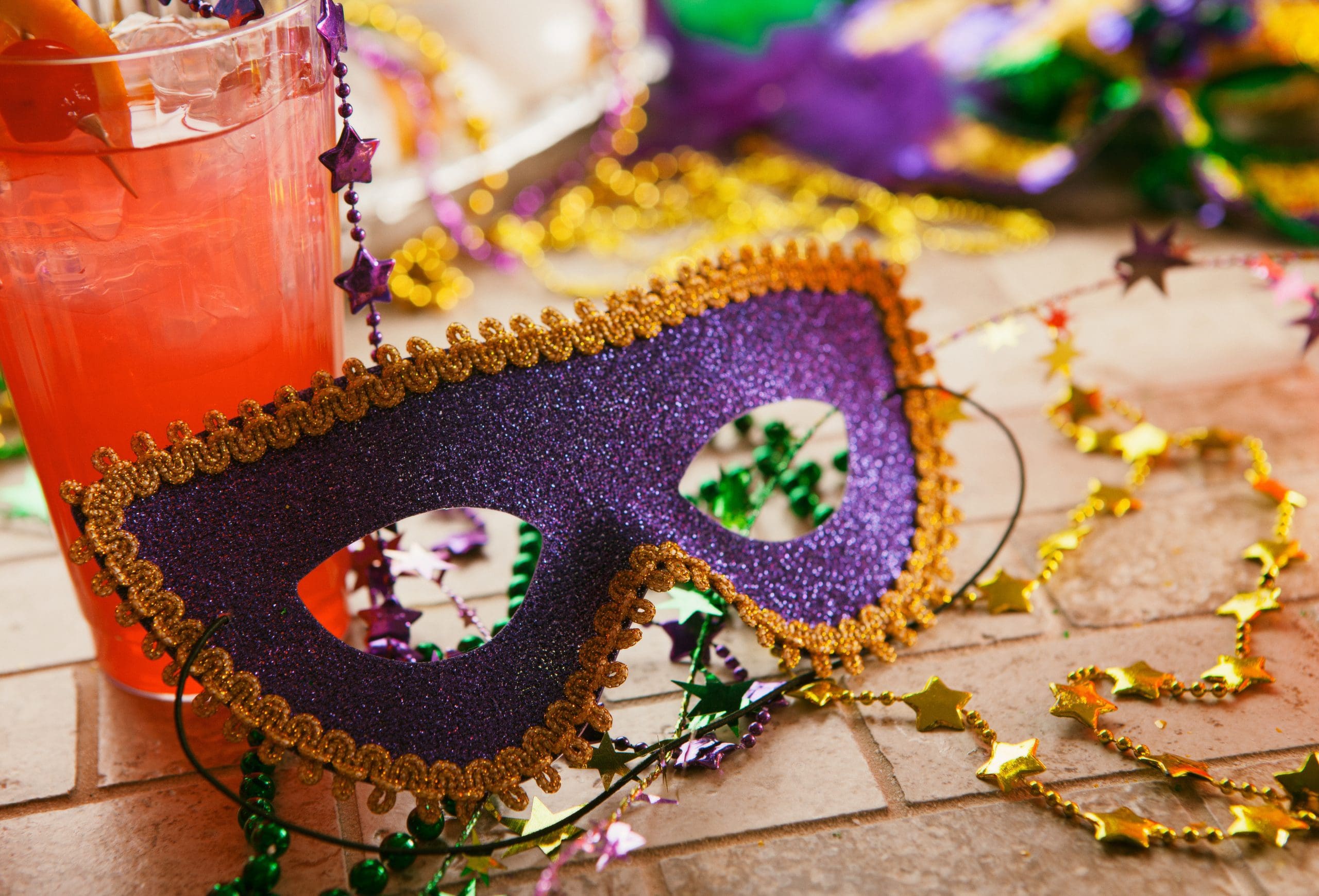 Series for the celebration of Mardi Gras, including Hurricane drinks, a King Cake, masks and trinkets.