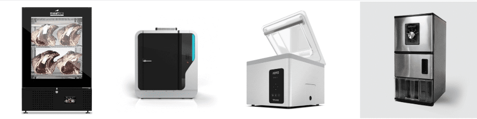 product line Four kitchen appliances are displayed side by side: a meat dry-aging cabinet, a sleek dark-colored coffee machine, a compact white ice cream maker, and a stainless steel ice maker—perfectly curated for Show 2025 by Storepoint Fresh.